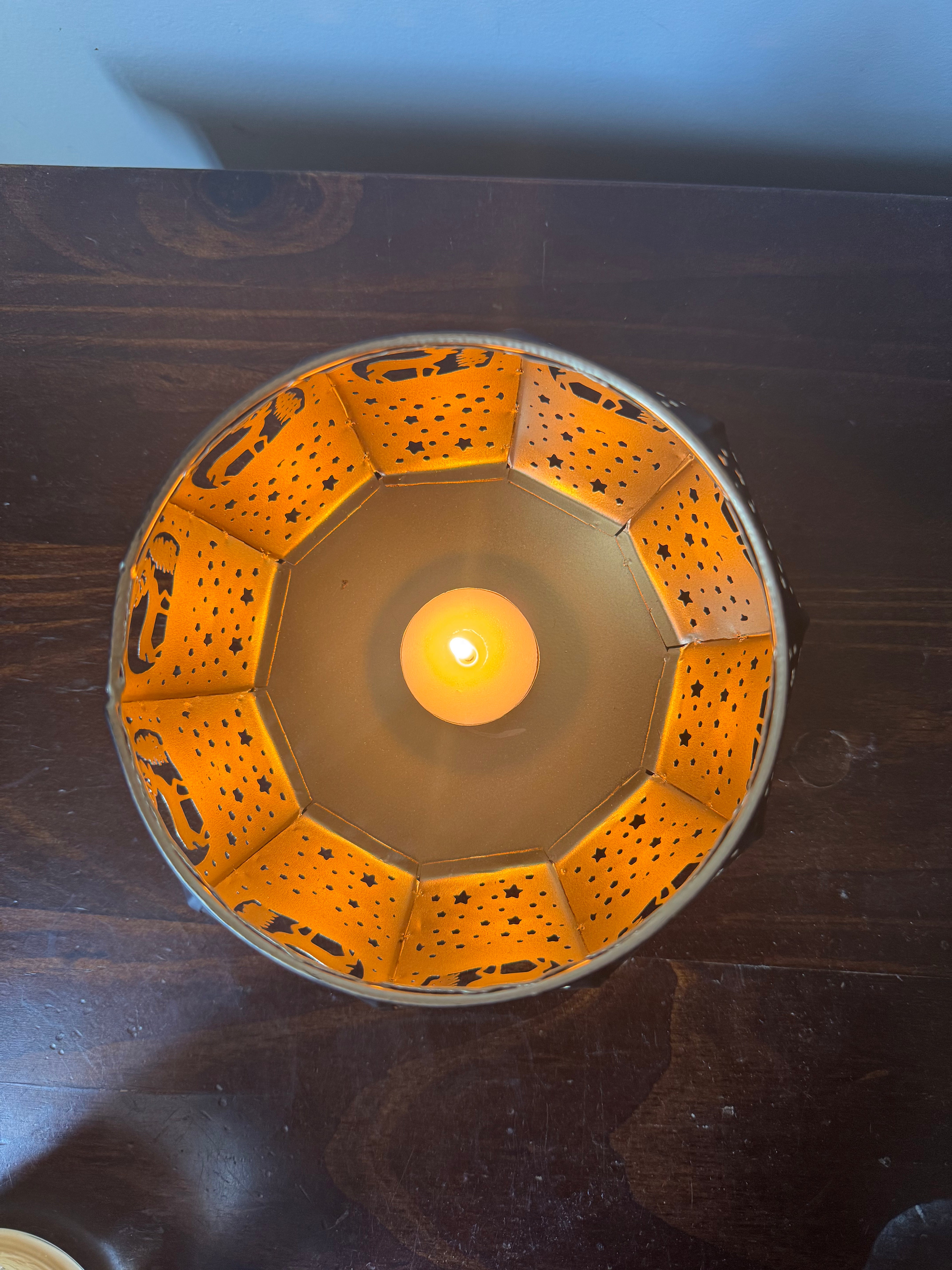 Inside surface of etched brass lamp- golden