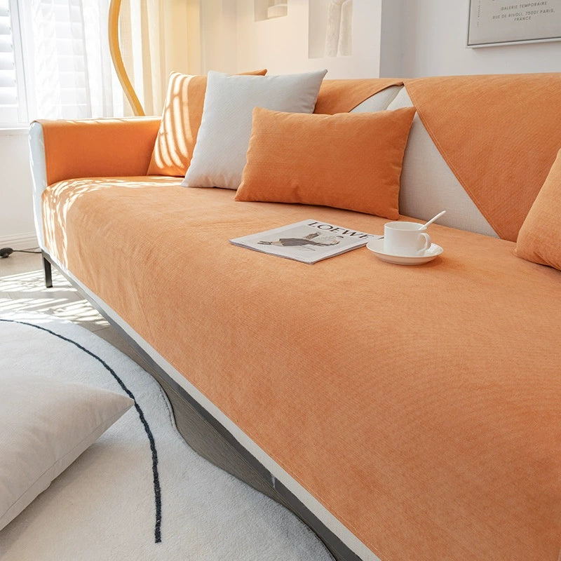 A plush chenille sofa cover in orange, displayed on a sofa, including a close-up of the waterproof fabric texture.