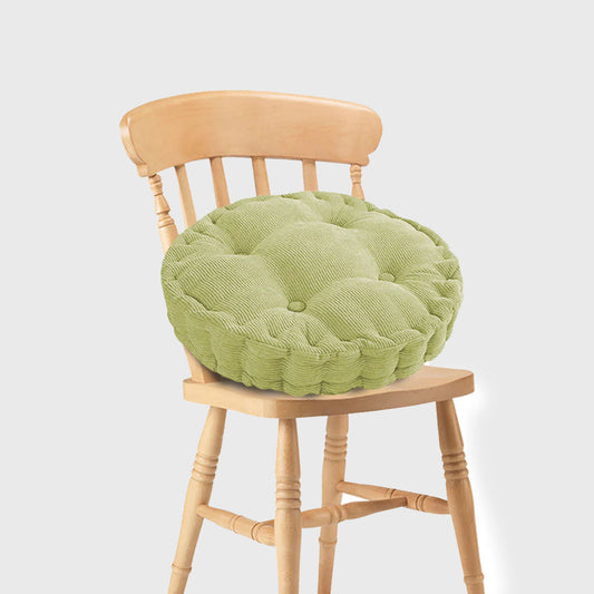 Green Plush Round Cushion made from eco-friendly materials, perfect for home decor and comfort, featuring a vibrant green color and plush design.